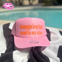 CHAMPAGNE IN MY HAND SAND IN MY CLAM TRUCKER HAT
