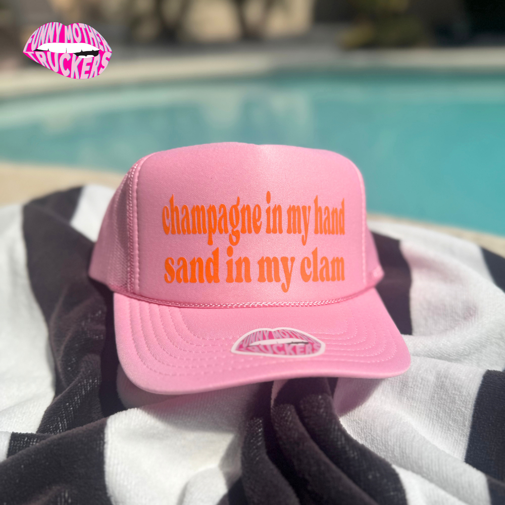 CHAMPAGNE IN MY HAND SAND IN MY CLAM TRUCKER HAT