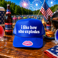 I LIKE HOW SHE EXPLODES TRUCKER HAT