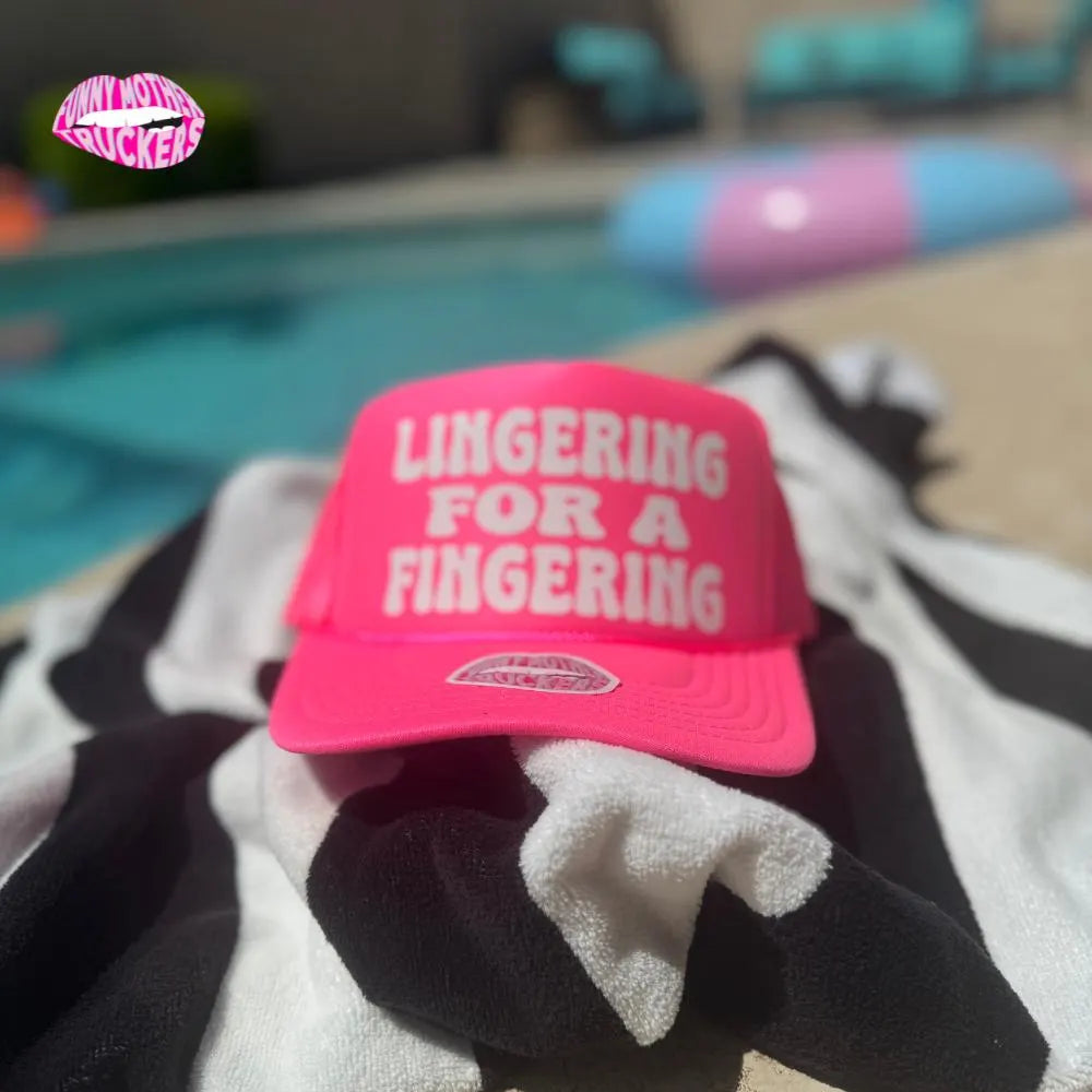 LINGERING FOR A FINGERING TRUCKER HAT