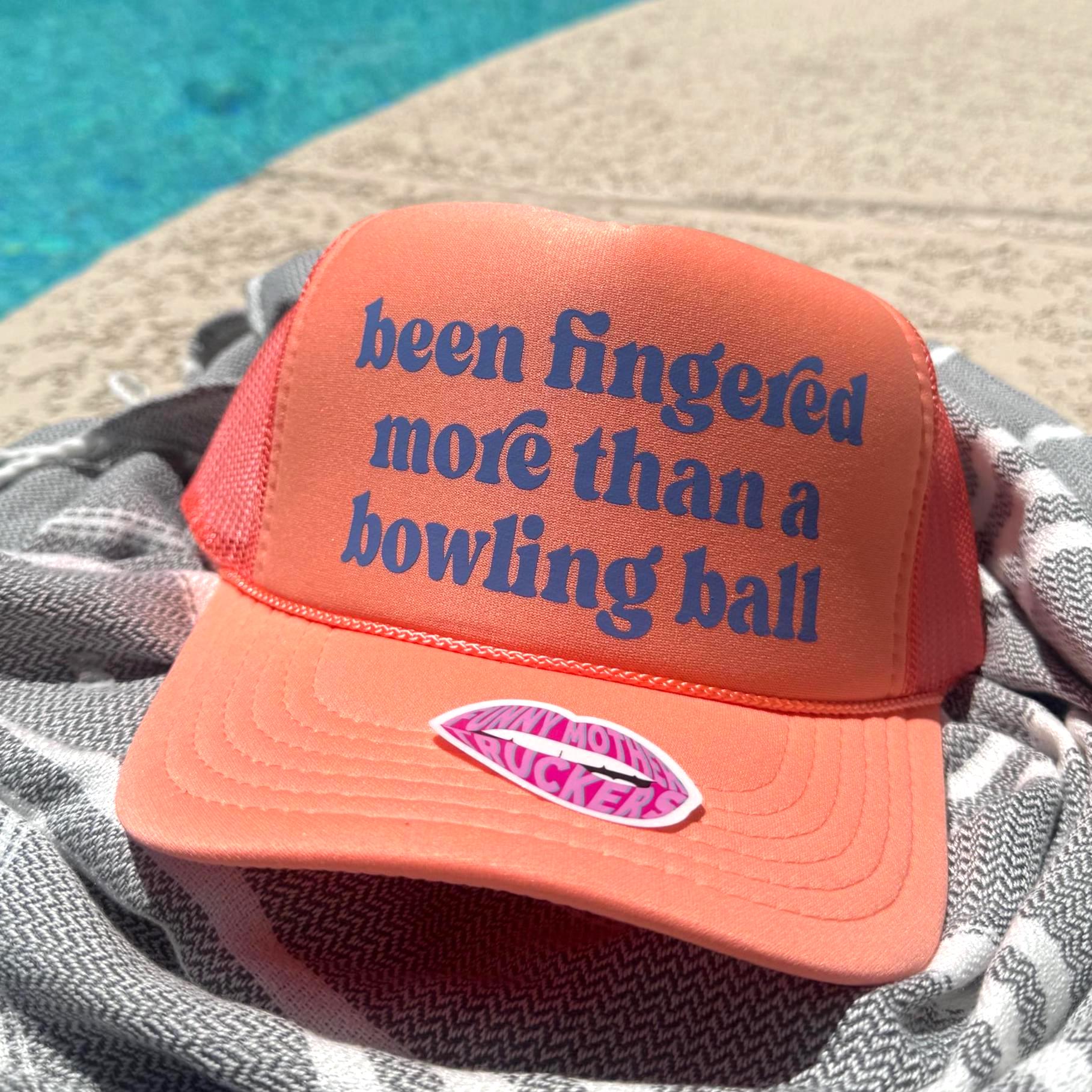 BEEN FINGERED MORE THAN A BOWLING BALL TRUCKER HAT