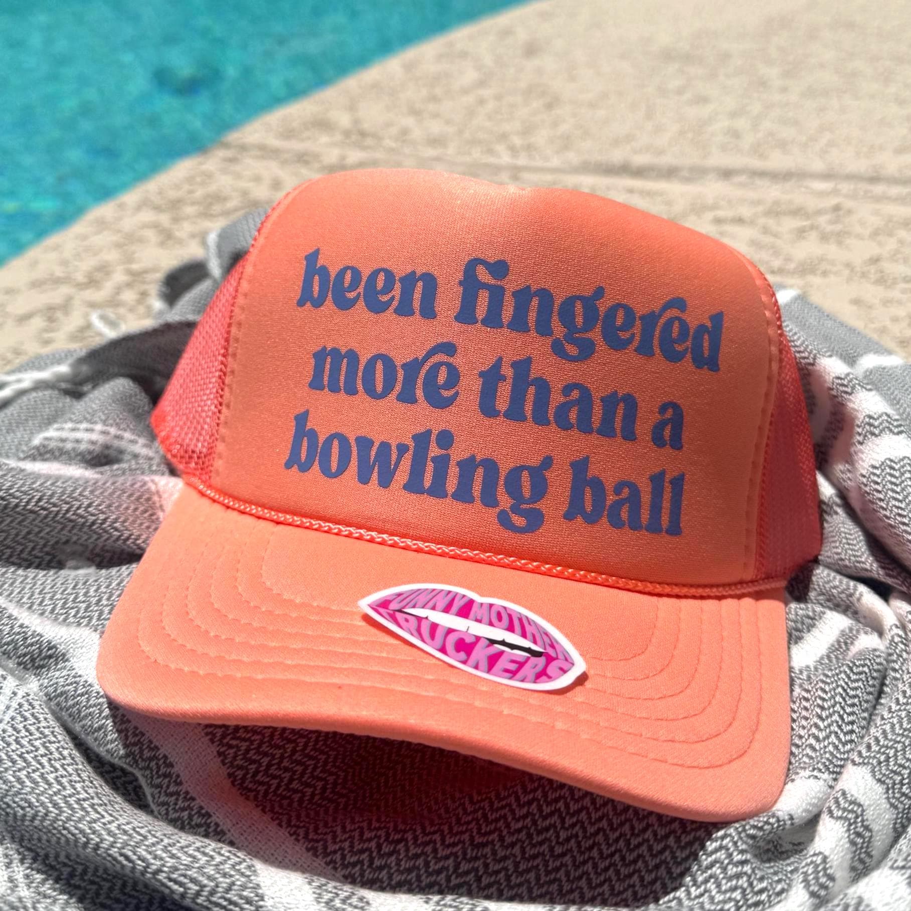 BEEN FINGERED MORE THAN A BOWLING BALL TRUCKER HAT
