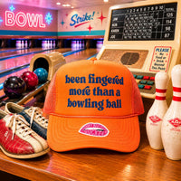 BEEN FINGERED MORE THAN A BOWLING BALL TRUCKER HAT